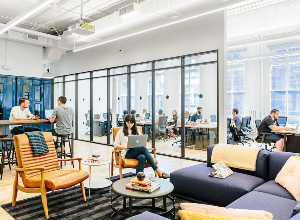 WeWork office with communal work and seating areas